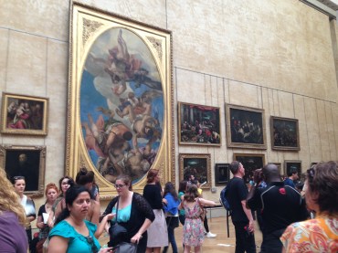 Some of the many paintings surrounding the Mona Lisa.